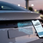 Akıllı telefon ile otomobil plakası üzerinden araç geçmişi ve hasar kaydı sorgulama işlemi.